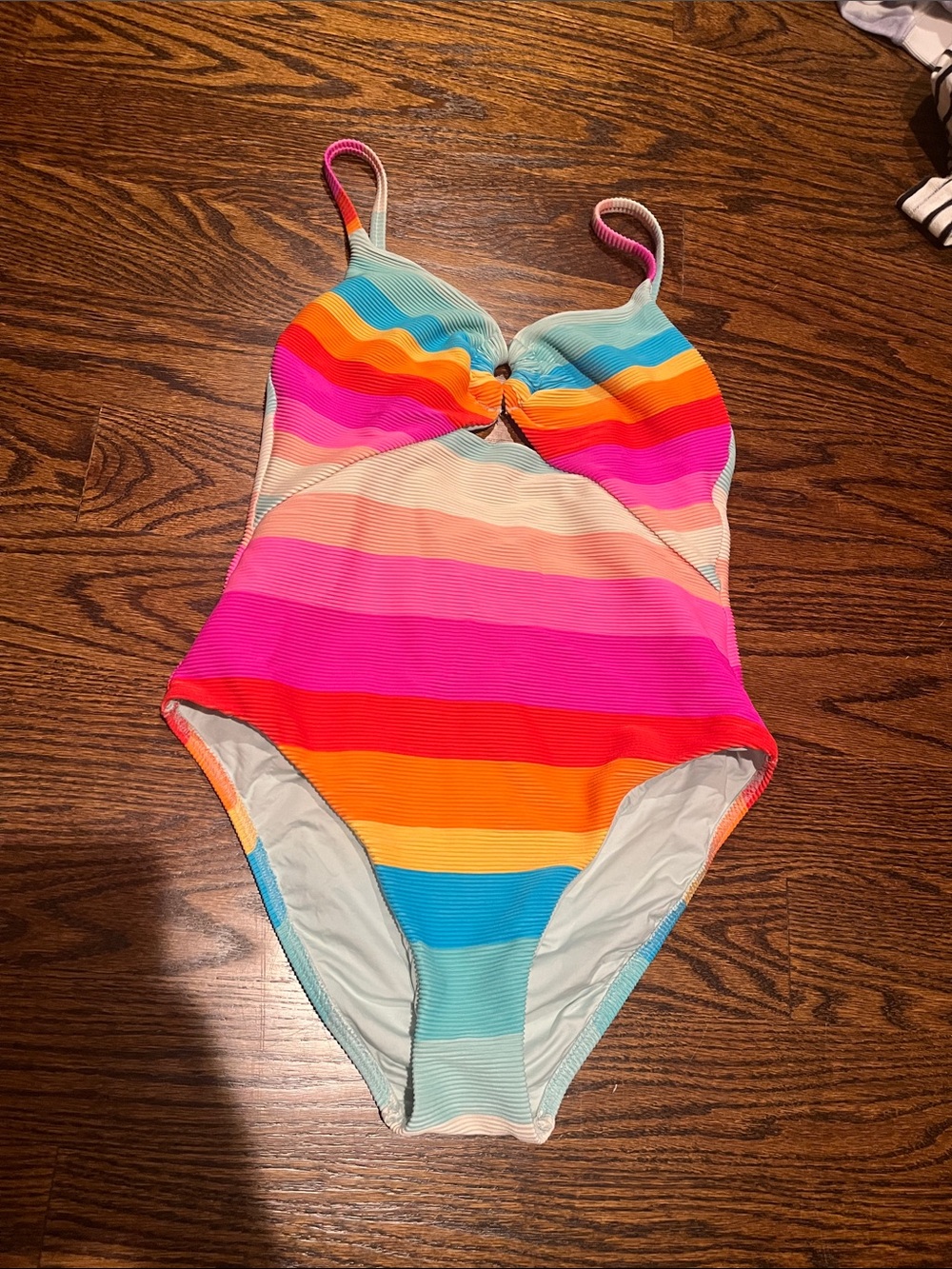 Vibrant color striped, ribbed bathing suit with keyhole opening